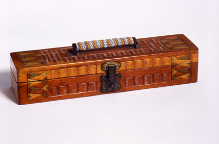Box with beaded handle.